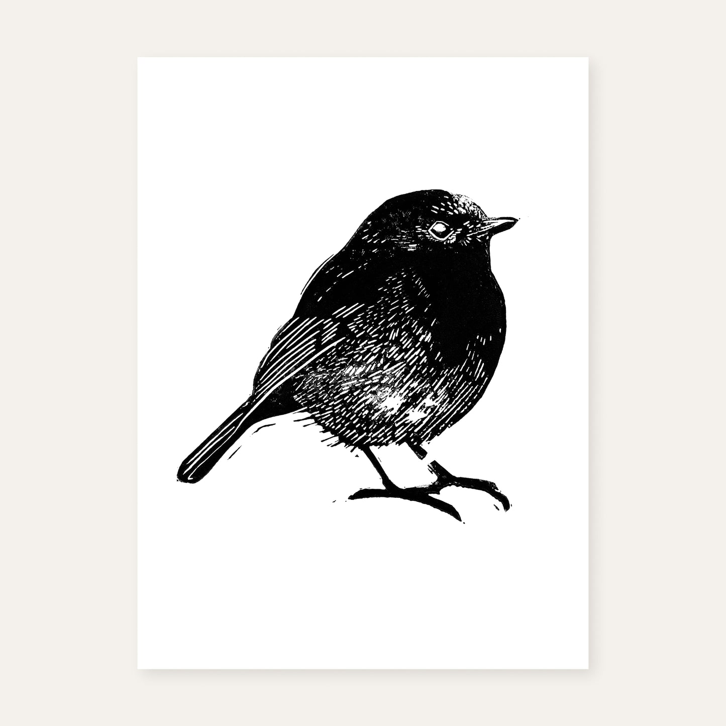 Linocut print of a robin.